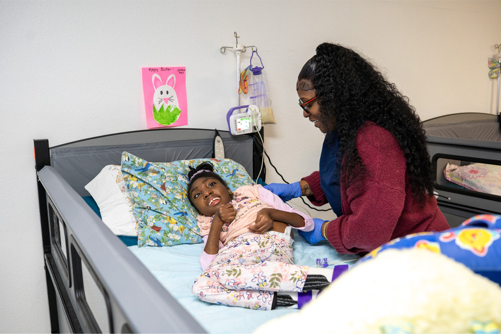 Girl receiving tablets from doctor